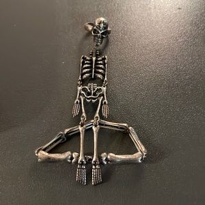 Skull/skeleton ring and bracelet combo.